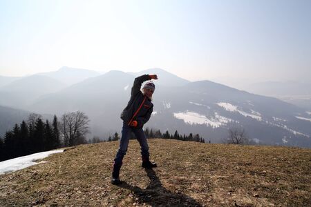 girl have fun with sport in mountains