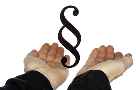 two hands are taking a paragraph symbolの写真素材