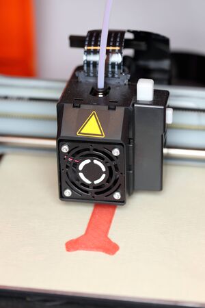 3d printer is working on a new modelの写真素材