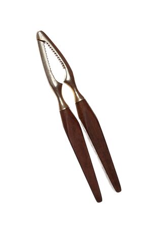 old wooden vintage nut cracker on white background