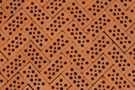 pattern with red bricks on a basementの写真素材