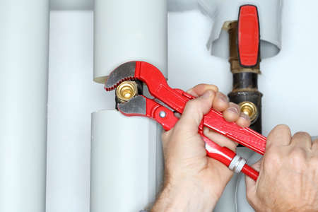 detail of repairing man with gripper in hand