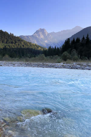 beautiful view to a river and mountainsの写真素材