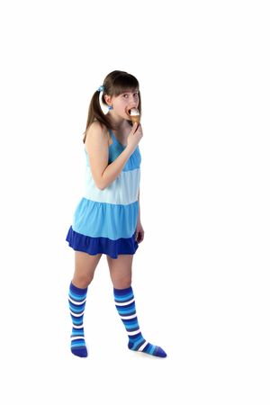 Young lady holding ice cream in a blue dressの写真素材