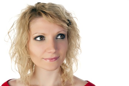 Blond girl looking away on a white backgroundの写真素材