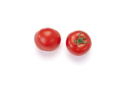 Two tomatoes isolated on white backgroundの写真素材