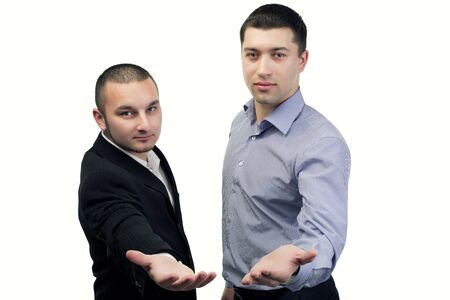 Two business people with welcome hands in frontの写真素材