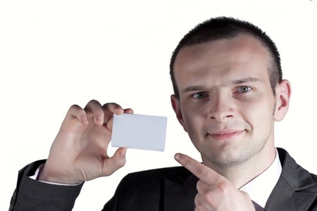 Business man showing his cardの写真素材