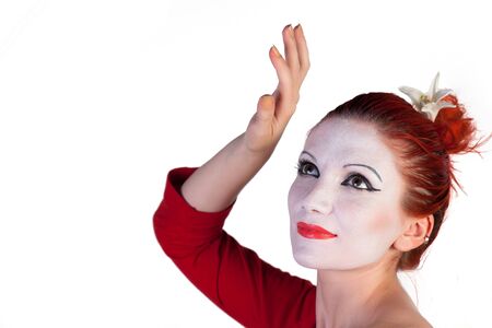 Beautiful young Geisha on a white backgroundの写真素材