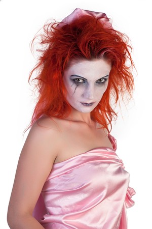 Scary girl posing on a white backgroundの写真素材