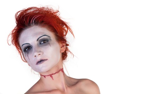 Scary girl posing on a white backgroundの写真素材