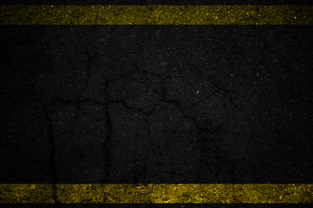 Crack back asphalt road surface background.の写真素材