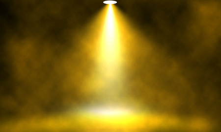 Spotlight glow yellow smoke background.の写真素材