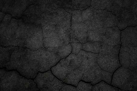 Crack black asphalt background.の写真素材