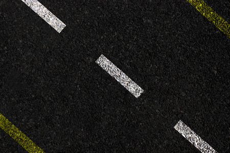 Asphalt road top view oblique angle background,Asphalt texture.の写真素材