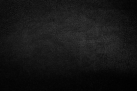 Black leather texture closeup background.の写真素材