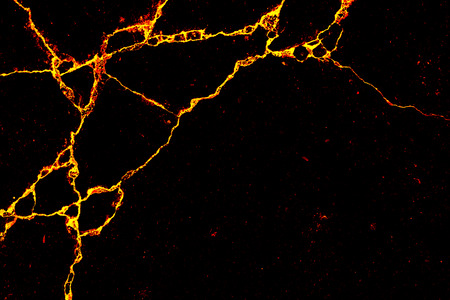 Cracked cement lava fire background.の写真素材