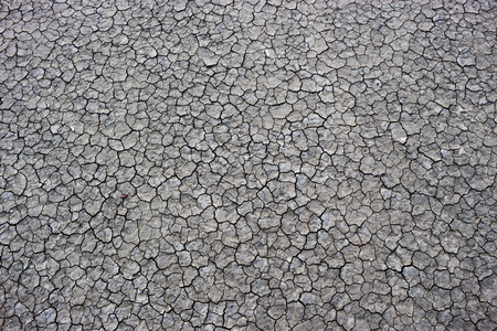 Crack ground drought area textured background.の写真素材
