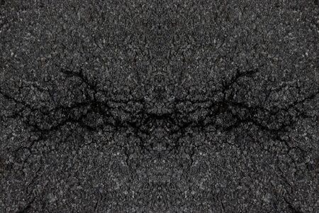 Crack asphalt road textured background.の写真素材