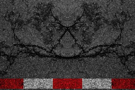 Red and white line on asphalt road texture background.の写真素材