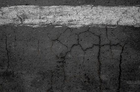 Old crack asphalt line background.の写真素材