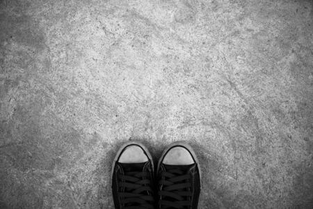 Shoes on concrete background.の写真素材