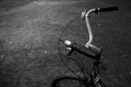 Vintage bicycle handlebars closeup background.の写真素材