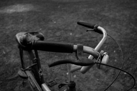 Old bicycle closeup background.の写真素材