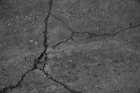 Crack asphalt road surface background.の写真素材