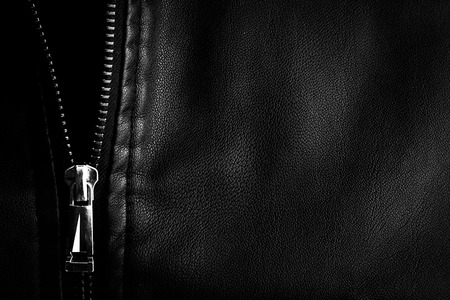Black leather texture close up background.の写真素材