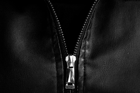 Black leather texture close up background.の写真素材