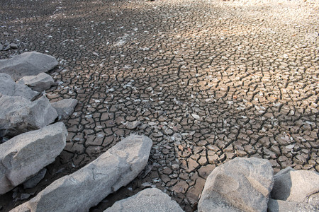 Drought crack ground close up background, crack soil area.の写真素材