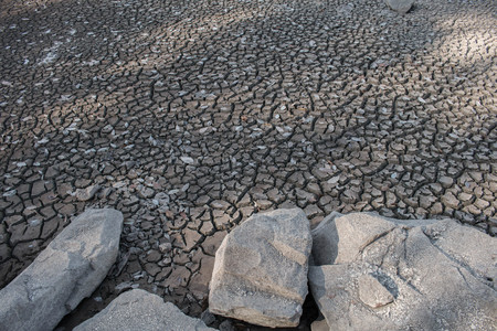 Drought crack ground close up background, crack soil area.の写真素材