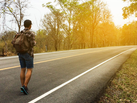 Male tourists Go out to find something in nature, Travel concept.の写真素材