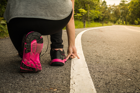 Women jogging for health close-up, Concept health love.の写真素材
