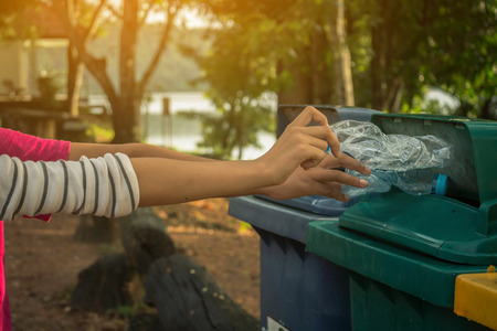 Group of kids volunteer help garbage collection charity environment.の写真素材