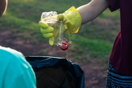 Group of kids volunteer help garbage collection charity environment.の写真素材