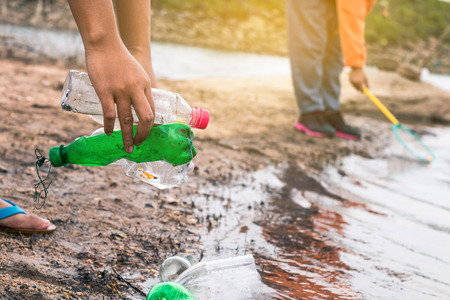 Group of kids volunteer help garbage collection charity environment.の写真素材