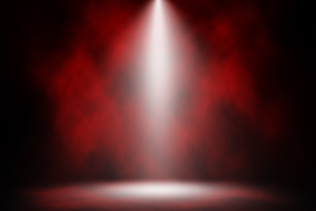 Red spotlight smoke stage entertainment background.の写真素材