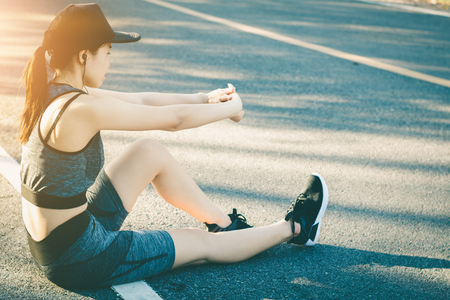 Young women stops resting after running.の写真素材