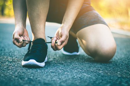 Young women foot is jogging for health.の写真素材