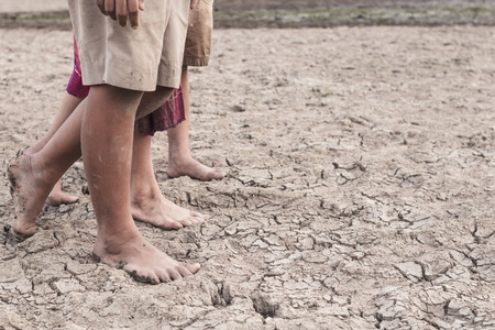 Drought caused by water shortage close up foot.の写真素材