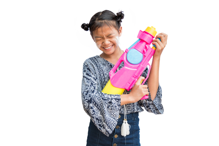 Child women playing water in Songkran festival isolated on white background.の写真素材