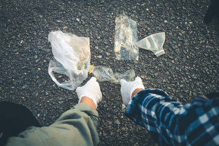 Women volunteer help garbage collection charity environment.の写真素材
