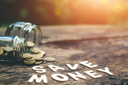 Putting coins in jar with money stack step growth saving money, Concept finance business investmentの写真素材