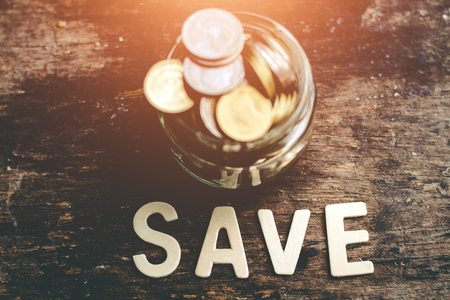 Putting coins in jar with money stack step growth saving money, Concept finance business investmentの写真素材