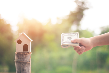 House on the hand child in nature, Concept Investment in real estate finance.の写真素材