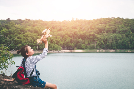 Female tourists in beautiful nature in tranquil scene, concept tourists backpack.の写真素材