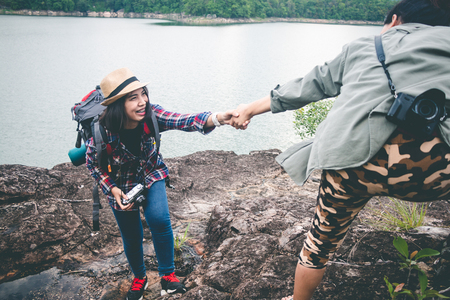 Female tourists in beautiful nature in tranquil scene, concept tourists backpack.の写真素材