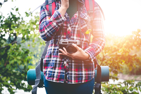 Female tourists in beautiful nature in tranquil scene, concept tourists backpack.の写真素材